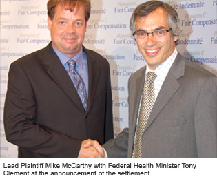 Lead Plaintiff Mike McCarthy with Federal Health Minister Tony Clement at the announcement of the settlement